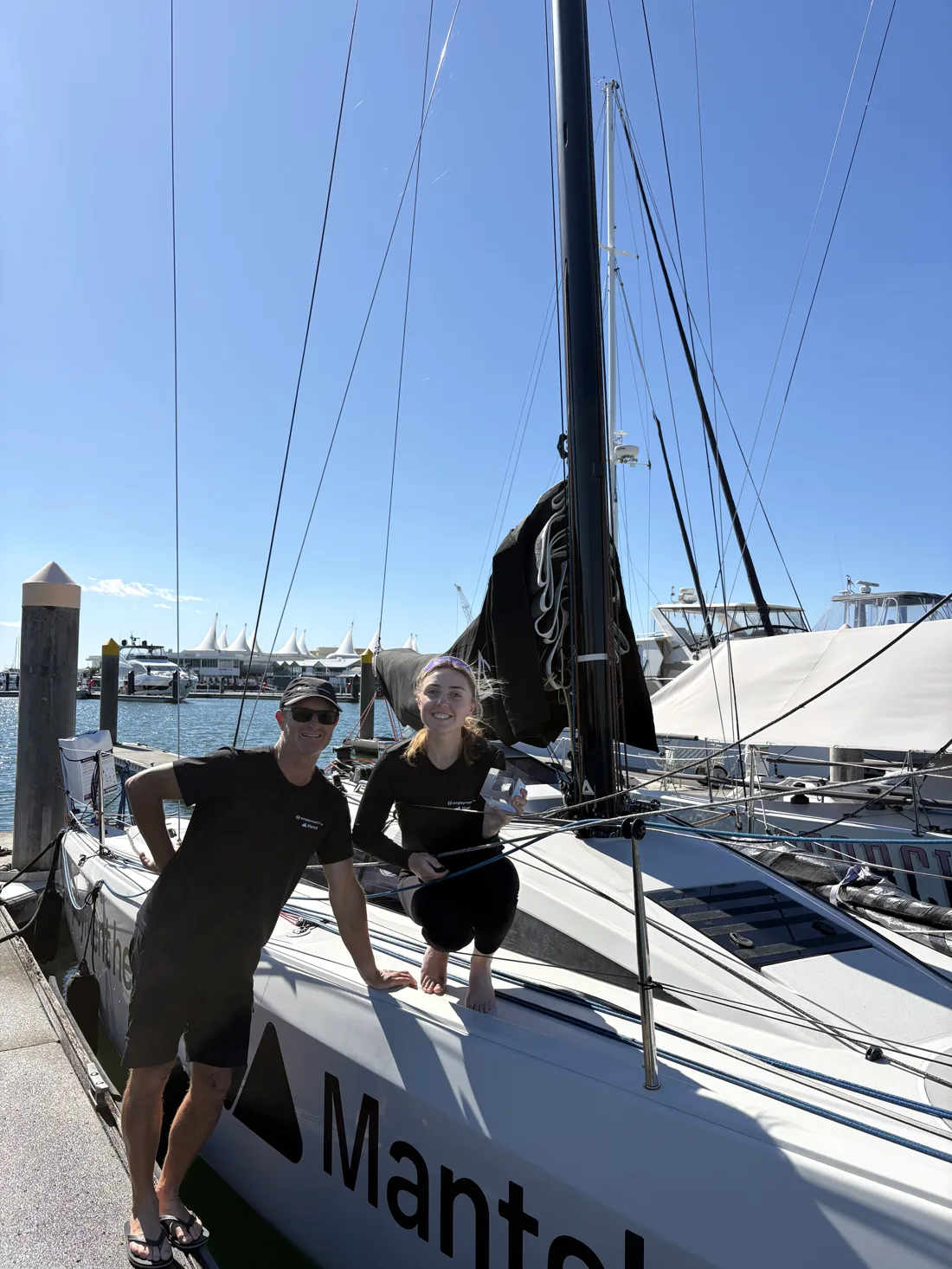 Annie and co-skipper Peter with the 2nd-place trophy at the Gold Coast